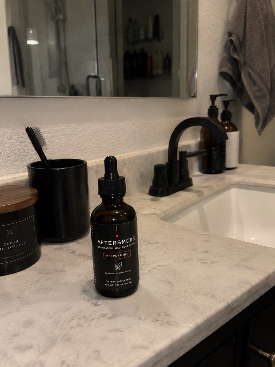 AfterSmoke bottle on a bathroom vanity