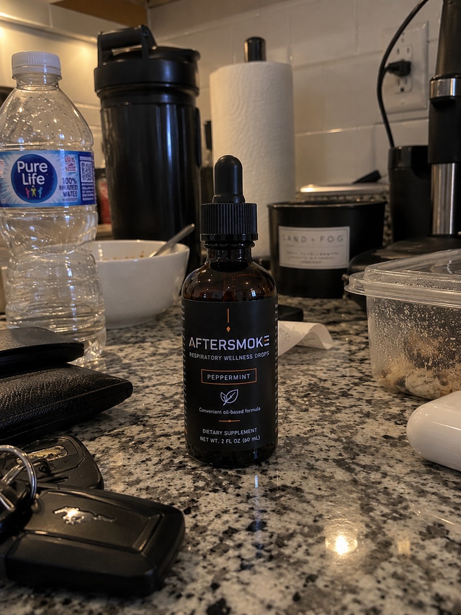 AfterSmoke bottle standing on a kitchen counter